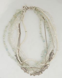 Mignon Faget Silver Necklace, 20th c., with seven strands, two of blue tinted clear stone beads, two strands of clear stone beads, one strand of seed 