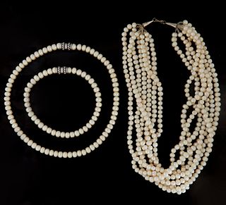 Three Pearl Jewelry Pieces, consisting of a flat pearl necklace and matching bracelet, each with a magnetic clasp, together with a seven strand neckla