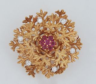 Vintage 18k Yellow Gold Circular Leaf Brooch, the center mounted with seven round seven point rubies, the outer border of the pin with six ten point r