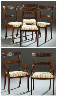 Set of Six (4 +2) American Classical Carved Mahogany Dining Chairs, early 20th c., each with a foliate arched crest rail with a central shell carving,