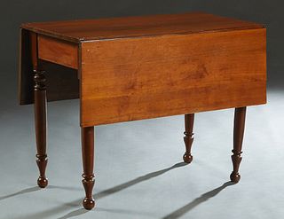 American Carved Mahogany Drop Leaf Dining Table, late 19th c. the rectangular top over a wide skirt, on turned tapered legs, H.- 29 1/8 in. W.- 38 7/8