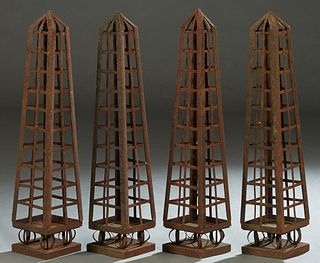 Set of Four Strap Iron Garden Obelisks, 20th/21st c., of tapered square form, H.- 39 in., W.- 7 7/8 in., D.- 7 7/8 in.