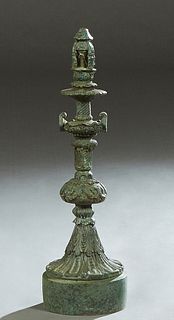 Patinated Bronze Pagoda Form Fountain Head, 20th/21st c., with a knopped relief support to a circular base, H.- 27 in., Dia.- 8 in.