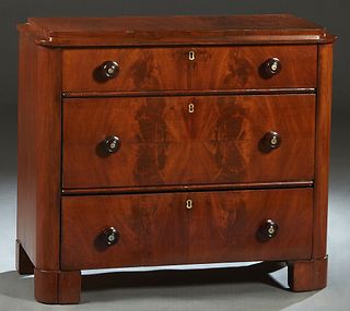 English Carved Mahogany Chest, 19th c., the stepped rounded corner top above three graduated drawers, on a rounded corner plinth base, H.- 34 in., W.-