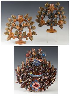 Three Pieces of Mexican Polychromed Clay Art, 20th c., consisting of an elaborate six light "Santo" candelabra; together with a pair of single floral 