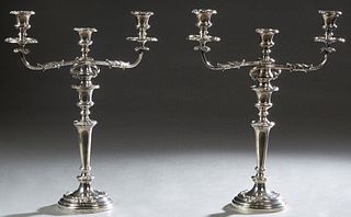 Pair of Victorian Silverplated Candelabra, late 19th c., by Smith, Sissons & Co., Sheffield, each with a baluster support decorated with acanthus scro