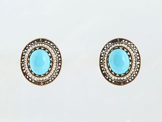 Vintage Pair of 18K Yellow Gold Pierced Earrings, with an oval app 2.5 ct. cabochon Persian turquoise atop a graduated border of tiny seed pearls and 