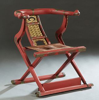 Large Chinese Style Gilt and Red Lacquered Folding Armchair, 20th c., the U-shaped back with incised brass mounts and a pierced gilt vertical center s