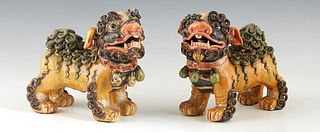 Pair of Chinese Glazed Foo Lions, 19th c, with elaborate applied decoration, H.- 5 3/4 in., W.- 6 in., D.- 3 in.
