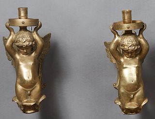 Pair of Gilt Bronze Putti Sconces, 20th/21st c., with 3 1/2 in. fitters, H.- 14 1/2 in., W.- 5 1/2 in., D.- 10 1/2 in.