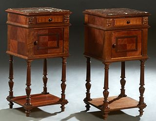 Pair of French Louis XVI Style Carved Mahogany Marble Top Nightstands, early 20th c., the inset highly figured rouge marble over a reeded frieze drawe