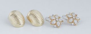 Two Pair of 18K Gold Clip Earrings, consisting of a pair of ribbed oval dome examples; and a pair of yellow and white gold floriform examples, each of