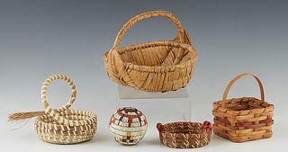 Group of Five Native American Objects, consisting of a Gullah small market basket; a small Seminole coiled pine basket; a medicine ball made with dyed