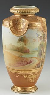 Large Hand Painted Nippon Baluster Vase, late 19th c., the heavy gilt decorated indented shoulders over a landscape reserve, on an integral socle base