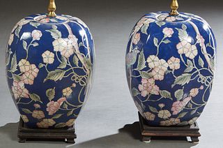 Pair of Japanese Square Baluster Covered Jars, with incised and polychromed bird and floral decoration on a blue ground, now mounted on stepped eboniz