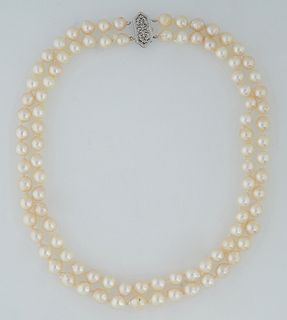 14K Vintage Double Strand of White Cultured 7mm Pearls, early 20th c., with a 14K white gold clasp, L.- 15 1/2 in.