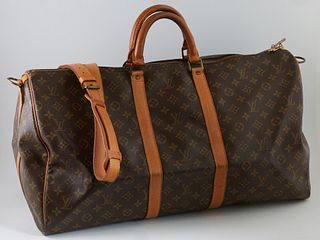 Louis Vuitton Brown Monogram Coated Canvas 55 Keepall Bandouliere Travel Bag, the vachetta leather handles and adjustable strap with golden brass hard