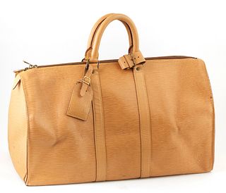 Louis Vuitton Rare Vintage Keepall Beige Epi Calf Leather 45 Travel Bag, with golden brass hardware, opening to a beige suede interior, the exterior w