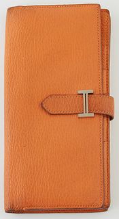 Hermes Orange Chevre Myzore Bearn Wallet, the calf leather with palladium plated hardware and pull through closure, opening to one card holder, four b