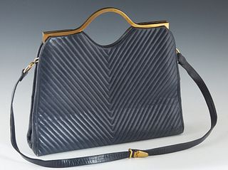 Vintage Blue Leather Judith Leiber Shoulder Bag, with chevron stitch detailing and gold hardware, the interior of the bag lined in a matching blue sil