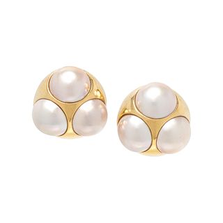 TIFFANY & CO., PALOMA PICASSO, YELLOW GOLD AND CULTURED MABE PEARL EARCLIPS