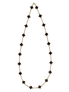 VAN CLEEF & ARPELS, YELLOW GOLD AND ONYX 'ALHAMBRA' NECKLACE