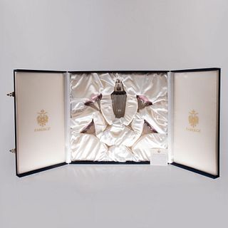 Lote de 4 copas y agitador. Siglo XX.  De la marca Fabergé. Modelo Gran Duque. Elaborado en cristal color amatista marcadas al ácido.