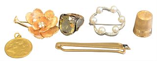Six Piece Lot, to include two gold pins, one thimble, one ring, one pendant, one tie tack, mostly 14 karat, 34.3 grams. 