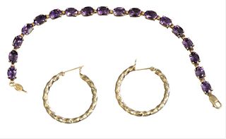 Two Piece 14 Karat Gold Lot, to include a gold bracelet set with oval amethysts, along with a pair of 14 karat gold loop earrings, 11.3 grams total we