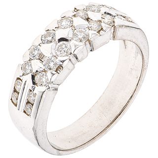 RING WITH DIAMONDS IN 18K WHITE GOLD 20 Brilliant cut diamonds ~0.60 ct. Weight: 6.7 g. Size: 7
