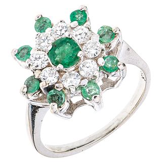 RING WITH EMERALDS AND DIAMONDS IN 14K WHITE GOLD 9 Round cut emeralds ~0.60 ct and 8 Brilliant cut diamonds~0.56 ct