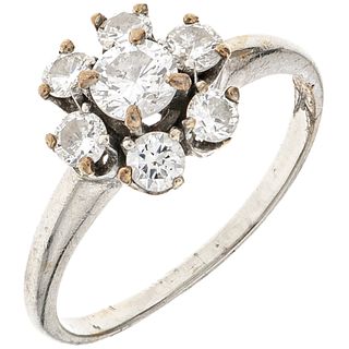 RING WITH DIAMONDS IN 14K WHITE GOLD 1 Brilliant cut diamond ~0.30 ct Clarity: I1-I2 and 6 Brilliant cut diamonds~0.60ct