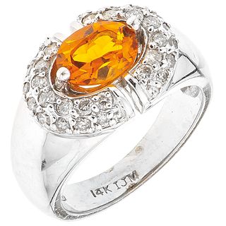 RING WITH CITRINE AND DIAMONDS IN 14K WHITE GOLD 1 Oval cut citrine~1.0 ct and 30 Brilliant cut diamonds~0.60 ct. Size: 6¾