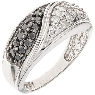 RING WITH DIAMONDS IN 14K WHITE GOLD 24 Brilliant cut black and white diamonds ~0.48 ct. Size: 6 ¾