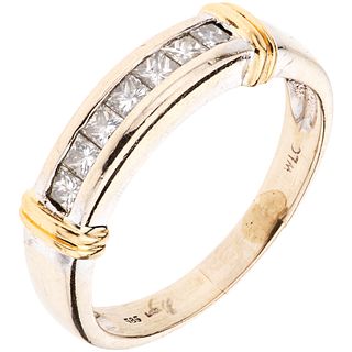 RING WITH DIAMONDS IN 14K WHITE GOLD 7 Princess cut diamonds ~0.42 ct. Weight: 4.3 g. Size: 8
