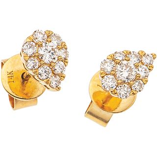 PAIR OF STUD EARRINGS WITH DIAMONDS IN 14K YELLOW GOLD 18 Brilliant cut diamonds ~0.46 ct. Weight: 1.8 g