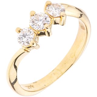 RING WITH DIAMONDS IN 12K YELLOW GOLD 3 Brilliant cut diamonds ~0.50 ct Weight: 2.8 g. Size: 7