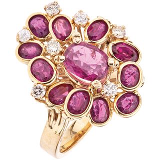 RING WITH RUBIES AND DIAMONDS IN 14K YELLOW GOLD 12 Oval cut rubies ~1.70 ct and 7 Brilliant cut diamonds~0.28ct. Size: 7 ¾