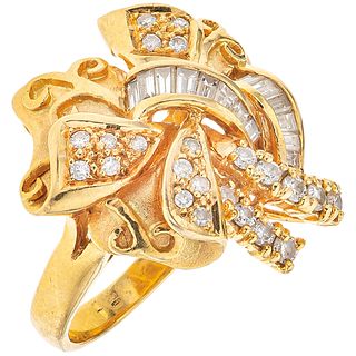 RING WITH DIAMONDS IN 18K YELLOW GOLD 23 Brilliant cut diamonds ~0.32ct and 14 Diamonds (different cuts) ~0.28ct. Size:7½