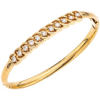 BRACELET WITH DIAMONDS IN 14K YELLOW GOLD 11 Brilliant cut diamonds ~1.10 ct. Weight: 22.5 g. Length: 6.6" (17.0 cm)