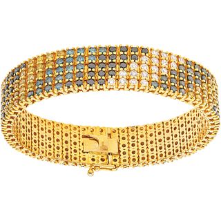 BRACELET WITH DIAMONDS IN 10K YELLOW GOLD 295 yellow, blue/green, black, white diamonds ~17.7 ct. Weight: 86.3 g