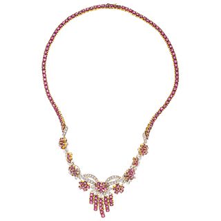 CHOKER WITH RUBIES AND DIAMONDS IN 18K YELLOW GOLD 153 Round cut rubies ~15.0 ctandy 75 Brilliant cut diamonds ~0.90 ct
