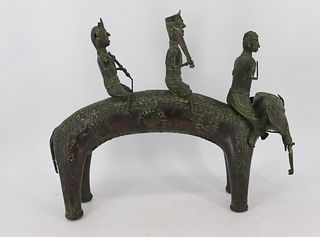 A patinated Bronze sculpture Of An Elongated