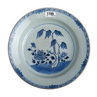 A CHINESE BLUE AND WHITE FLORAL DISH