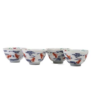 FOUR BLUE AND WHITE AND COPPER RED CUPS