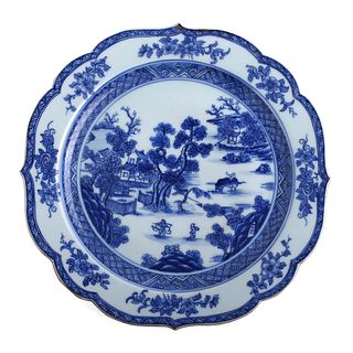 A CHINESE BLUE AND WHITE LANDSCAPE DISH