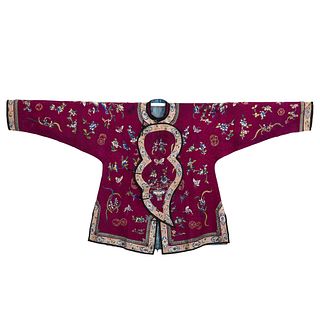 A CHINESE LADY'S CORAL-GROUND EMBROIDERED ROBE