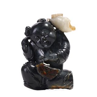 A BLACK AND WHITE JADE BOY CARVING 