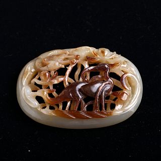 A WHITE AND RUSSET JADE CARVING