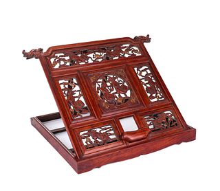 A CARVED HUANGHUALI BOOK STAND